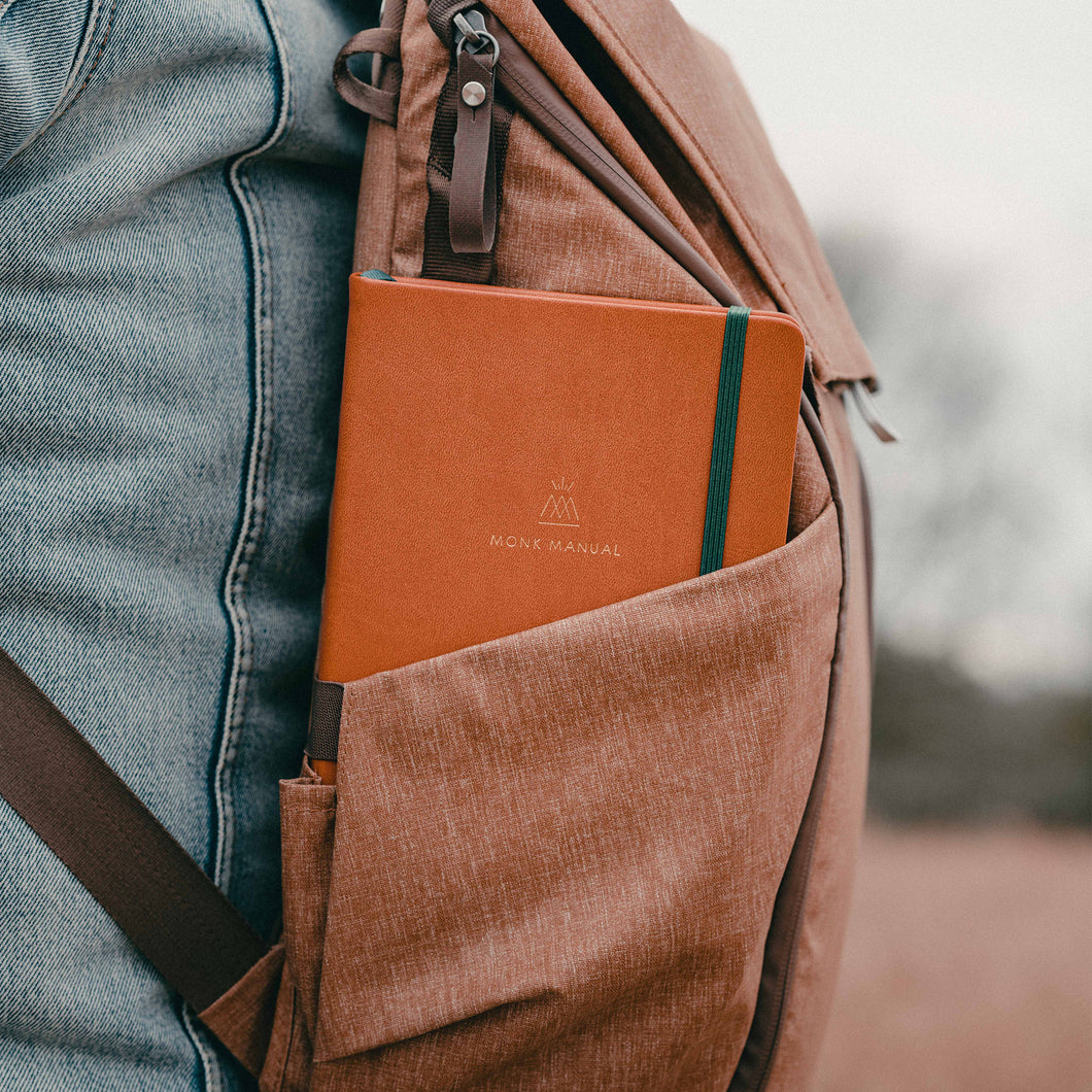 The monk manual travels well, as shown fitting in the side pocket of a backpack. 